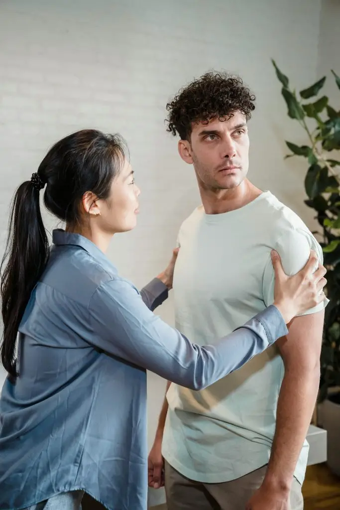 An emotional conversation between a couple inside, expressing tension and misunderstanding.